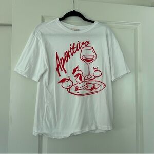 100 cotton aperitivo graphic tee trendy 
Xsmall fits oversized